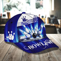 Right side view of bowling cap featuring white flaming pin-and-ball logo on a blue gradient background