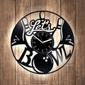 Bowling-themed wall clock with a 