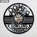 Bowling wall clock with a sleek bowling league design, featuring pins and a vintage clock face, perfect for sports enthusiasts and game rooms.