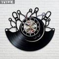 Stylish wall clock featuring a vinyl record design, with a bowling ball and pins graphic at its core, a perfect gift for bowling lovers.