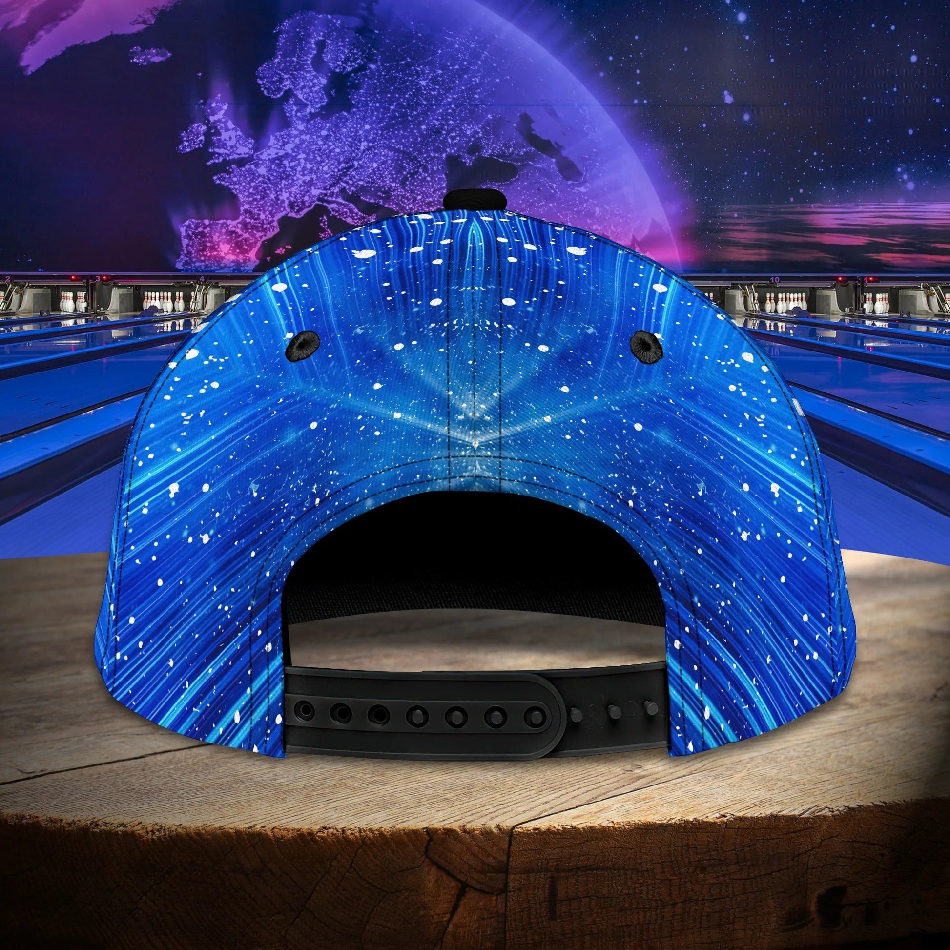 “Back view of cosmic bowling snapback hat showing swirling starfield pattern and adjustable snap closure.”