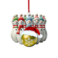 Gold snowflake themed snowman bowling pin Christmas ornament with red scarf