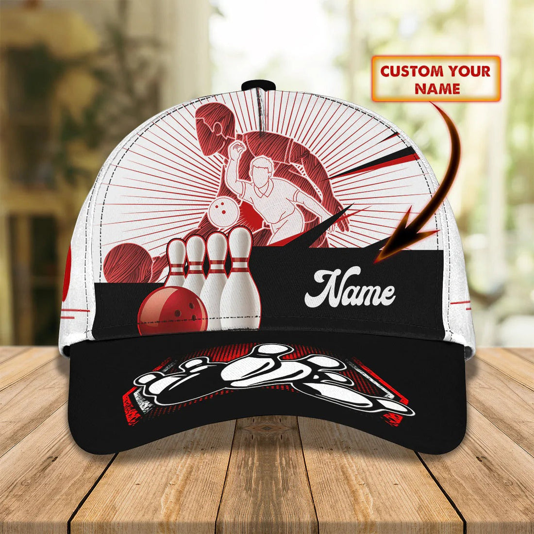 Front view of customizable bowling cap displaying name banner, ten-pin graphic, and dynamic speed lines