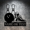 Black powder-coated bowling pins, ball, and shoes wall art on white background
