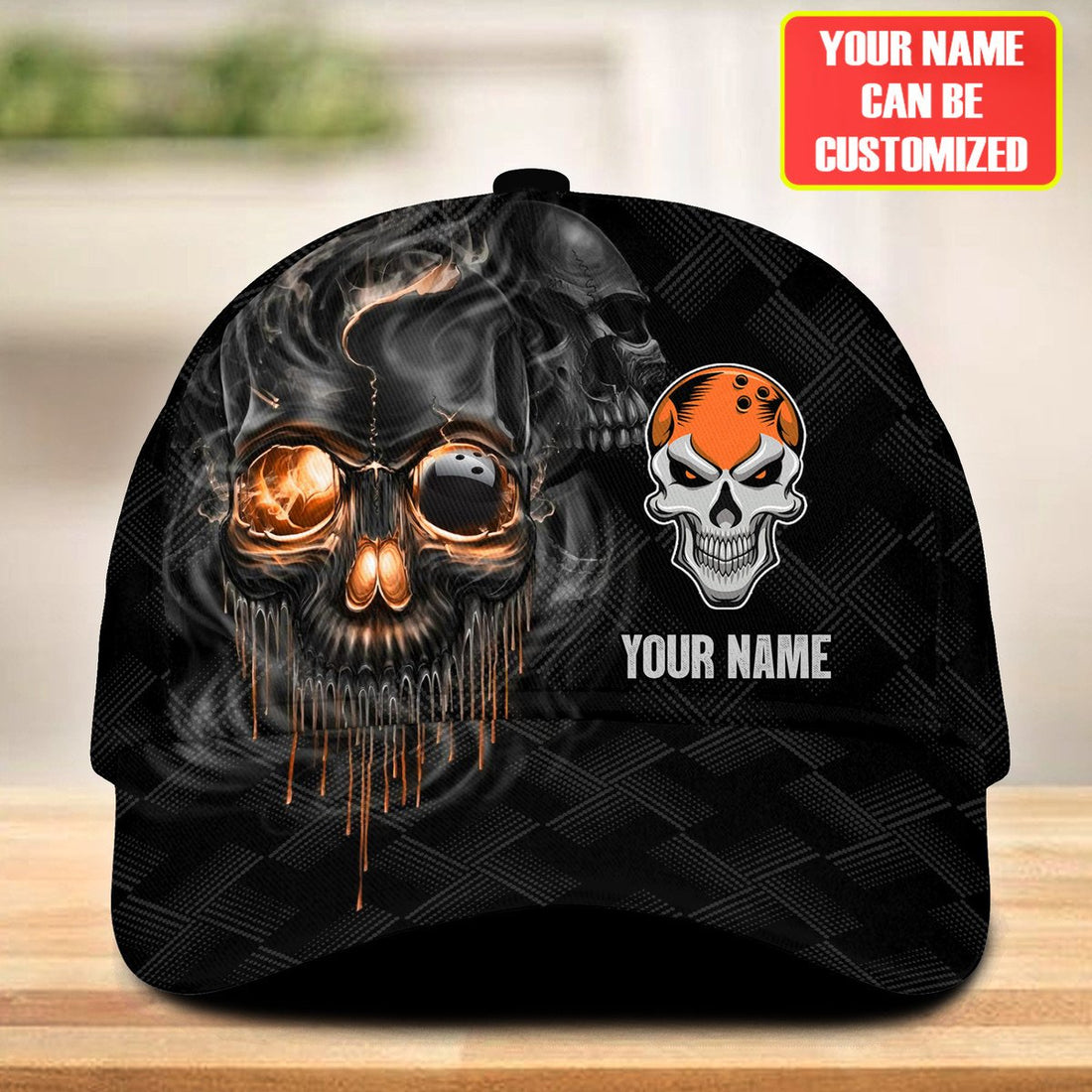 Black snapback bowling cap with orange-glowing smoke skull bowling-ball eye and dripping skull graphic
