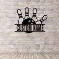 Strike Zone custom bowling name metal sign displayed on a modern tiled brick wall, featuring a ball hitting pins.